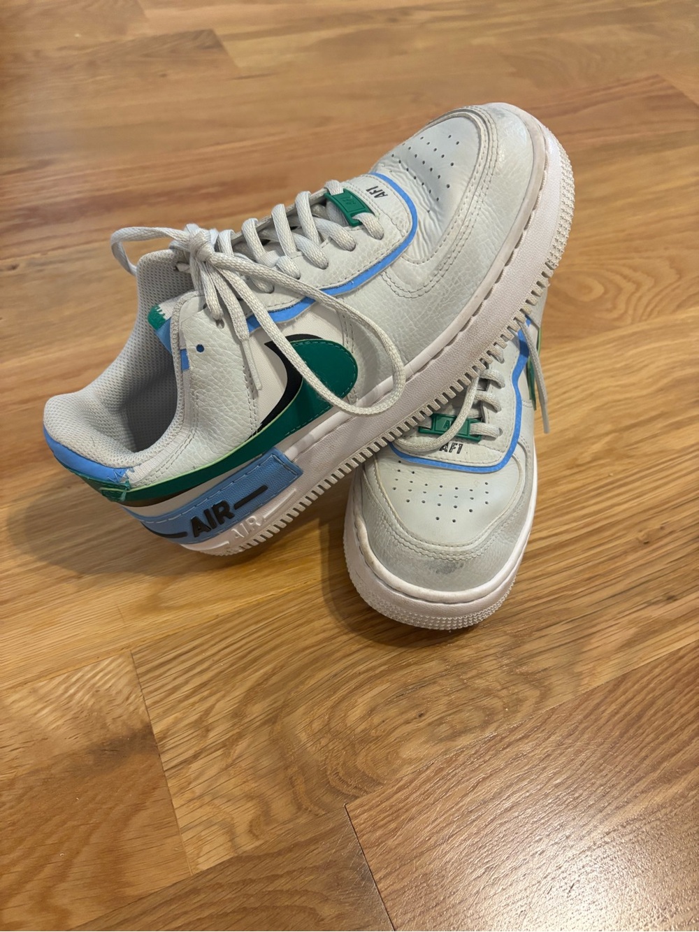 Nike White Sneakers with Green and Blue Accents